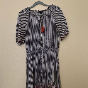 Blue and white striped dress with orange accents